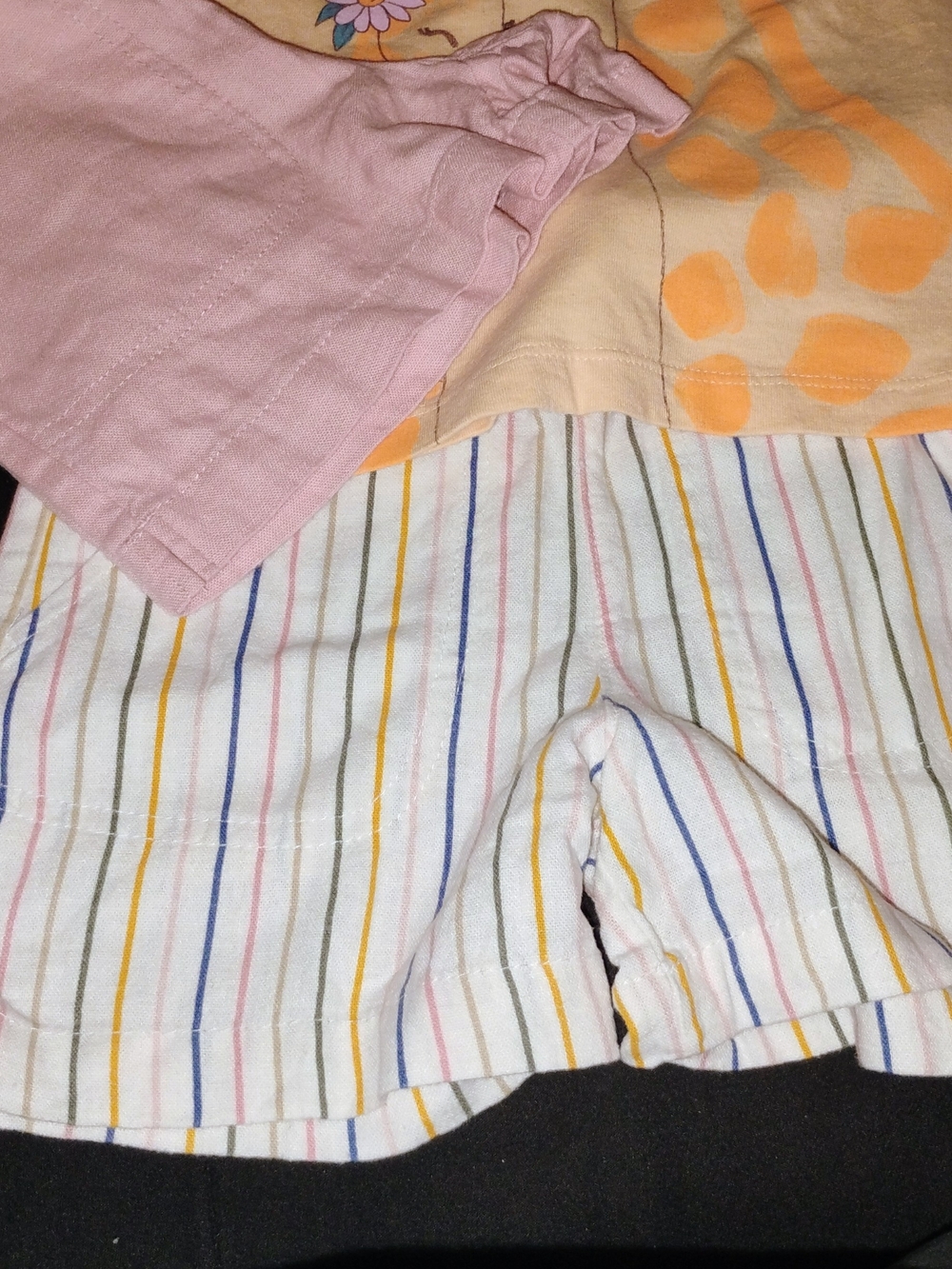 Girls Pastel Striped and Pink shorts.